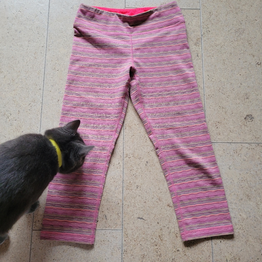 90 degree pink half leggings. Size 10/M. Used. Fair condition
